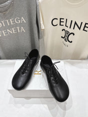 THE ROW 26S MINIMAL LACE-UP SHOES IN BLACK CALFSKIN
