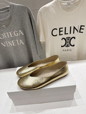 THE ROW 26S BALLET FLATS IN GOLD CALFSKIN