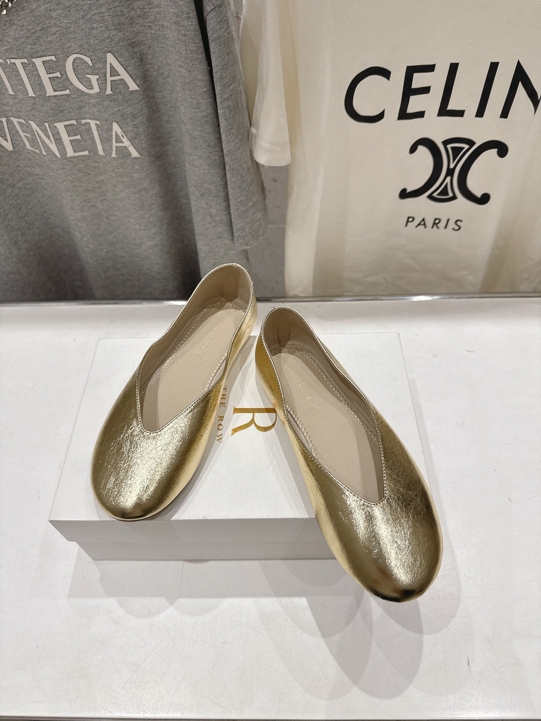 THE ROW 26S BALLET FLATS IN GOLD CALFSKIN