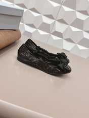 PRADA 26S ROUND TOE FLATS WITH BOW IN BLACK PATENT CALFSKIN