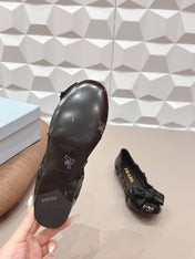 PRADA 26S ROUND TOE FLATS WITH BOW IN BLACK PATENT CALFSKIN