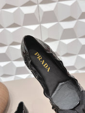 PRADA 26S ROUND TOE FLATS WITH BOW IN BLACK PATENT CALFSKIN