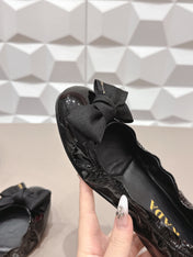 PRADA 26S ROUND TOE FLATS WITH BOW IN BLACK PATENT CALFSKIN
