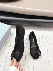 PRADA 26S ROUND TOE FLATS WITH BOW IN BLACK SUEDE