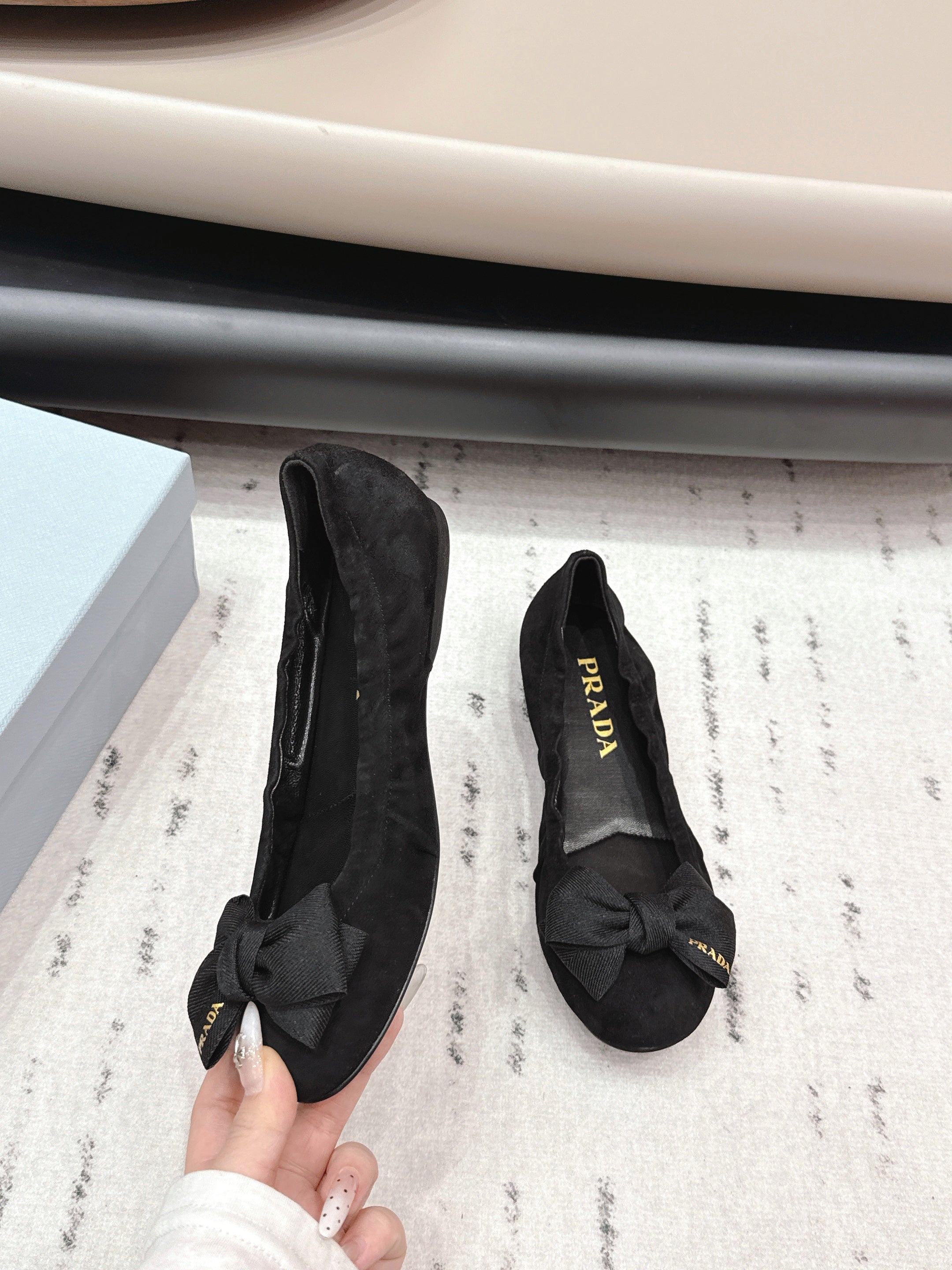 PRADA 26S ROUND TOE FLATS WITH BOW IN BLACK SUEDE