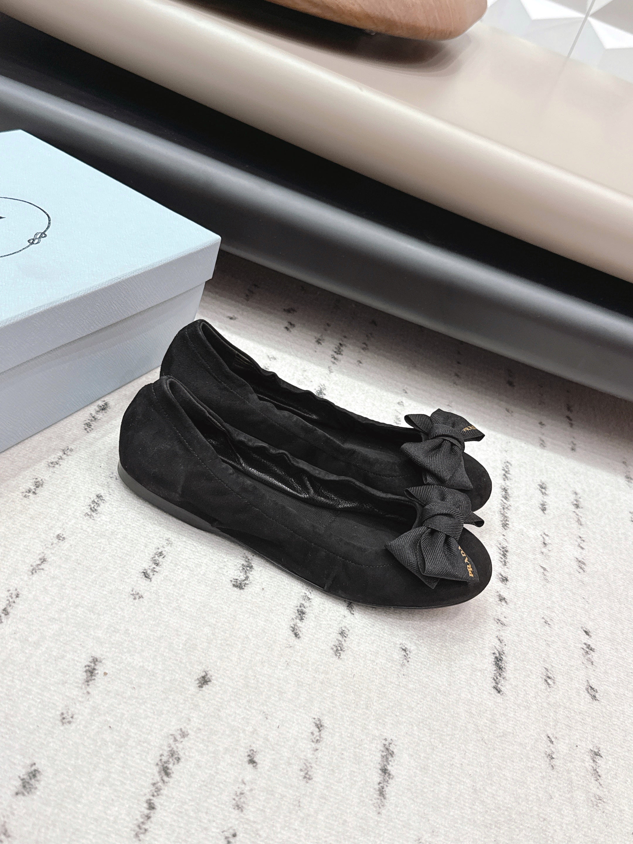 PRADA 26S ROUND TOE FLATS WITH BOW IN BLACK SUEDE