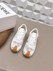 LOEWE 26S FLOW RUNNER SNEAKER IN WHITE FLORAL PATTERN SUEDE AND CALFSKIN