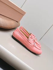MIUMIU 26S BOAT SHOES IN PINK EMBOSSED CALFSKIN