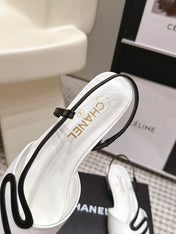 CHANEL 26S SLINGBACK FLATS IN WHITE CALFSKIN WITH BLACK TRIM