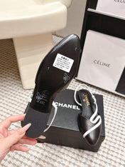 CHANEL 26S SLINGBACK FLATS IN BLACK CALFSKIN WITH WHITE TRIM