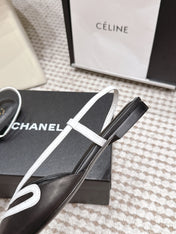 CHANEL 26S SLINGBACK FLATS IN BLACK CALFSKIN WITH WHITE TRIM