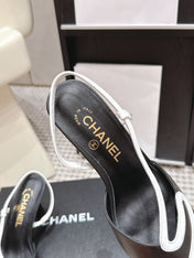 CHANEL 26S HIGH-HEEL SLINGBACKS IN BLACK CALFSKIN WITH WHITE TRIM