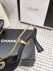 CHANEL 26S HIGH-HEEL SLINGBACKS IN BLACK SUESE WITH GOLD TRIM