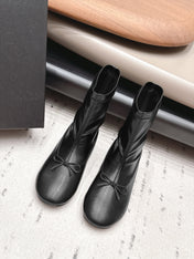 CHANEL 26S ANKLE BOOTS IN BLACK CALFSKIN LACE UP FRONT