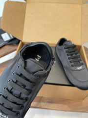PRADA 25S SNEAKER IN BLACK SILK