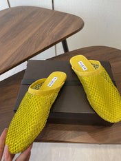 ALAIA 26S FLAT MULES IN DARK YELLOW SUEDE AND MESH RHINESTONE-EMBELLISHED