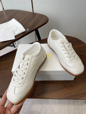 THE ROW 26S SNEAKERS IN WHITE CALFSKIN