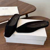 THE ROW 26S POINTED TOE MULES IN BLACK SUEDE