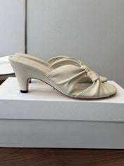 THE ROW 26S KNOT HEELED SLIDE SANDALS 35MM IN IVORY WHITE LAMBSKIN