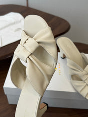 THE ROW 26S KNOT HEELED SLIDE SANDALS 35MM IN IVORY WHITE LAMBSKIN