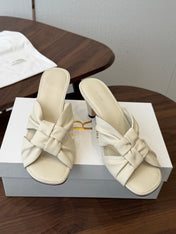 THE ROW 26S KNOT HEELED SLIDE SANDALS 35MM IN IVORY WHITE LAMBSKIN