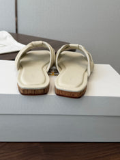 THE ROW 26S KNOT SLIDE SANDALS IN IVORY WHITE LAMBSKIN