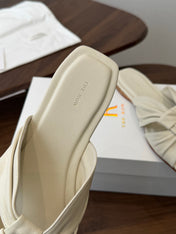THE ROW 26S KNOT SLIDE SANDALS IN IVORY WHITE LAMBSKIN