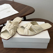 THE ROW 26S KNOT SLIDE SANDALS IN IVORY WHITE LAMBSKIN