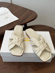 THE ROW 26S KNOT SLIDE SANDALS IN IVORY WHITE LAMBSKIN