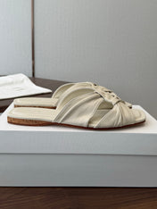THE ROW 26S KNOT SLIDE SANDALS IN IVORY WHITE LAMBSKIN
