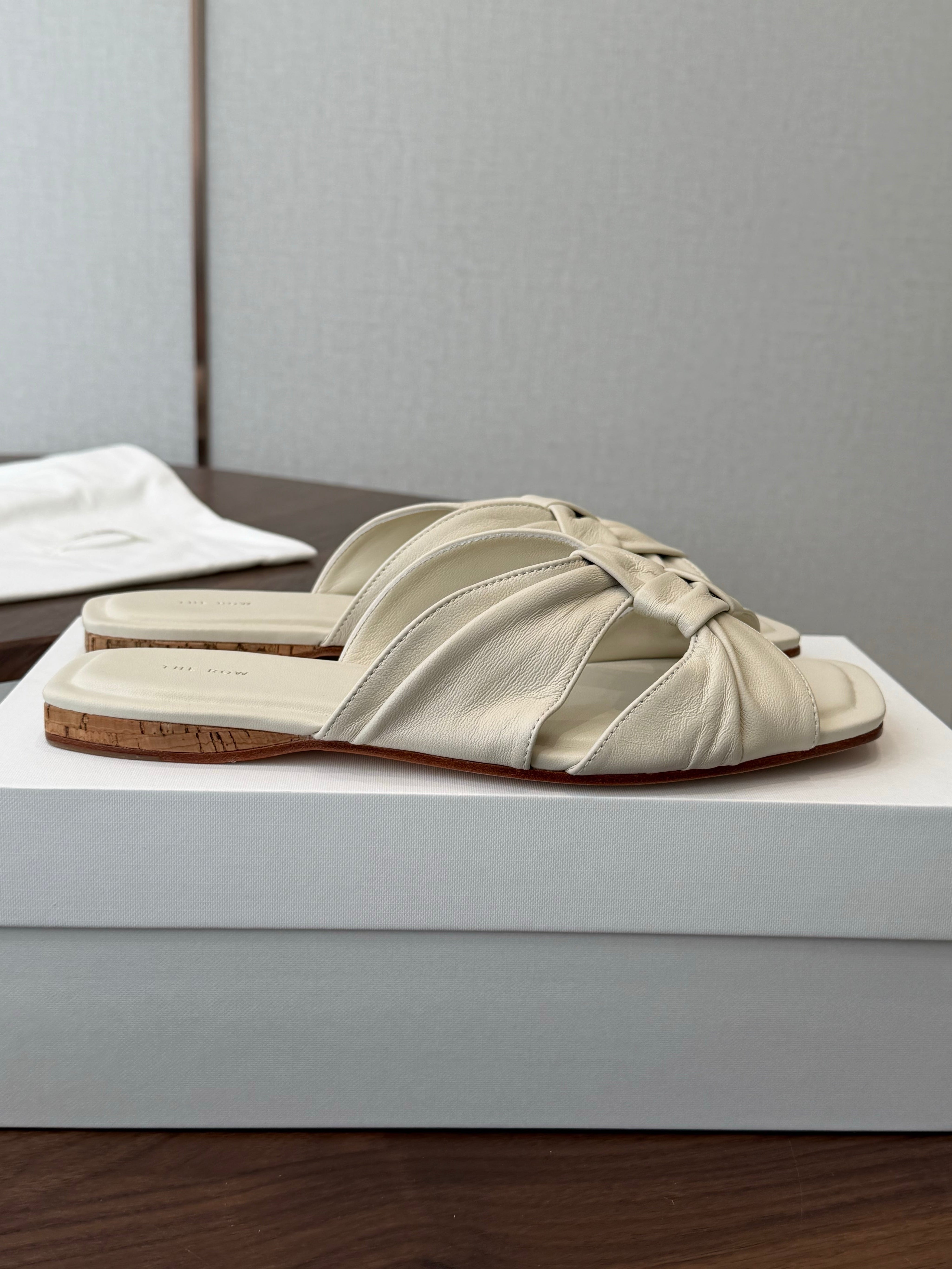 THE ROW 26S KNOT SLIDE SANDALS IN IVORY WHITE LAMBSKIN