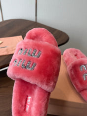 MIUMIU 26S CRYSTAL LOGO SLIDES IN PINK SHEARLING