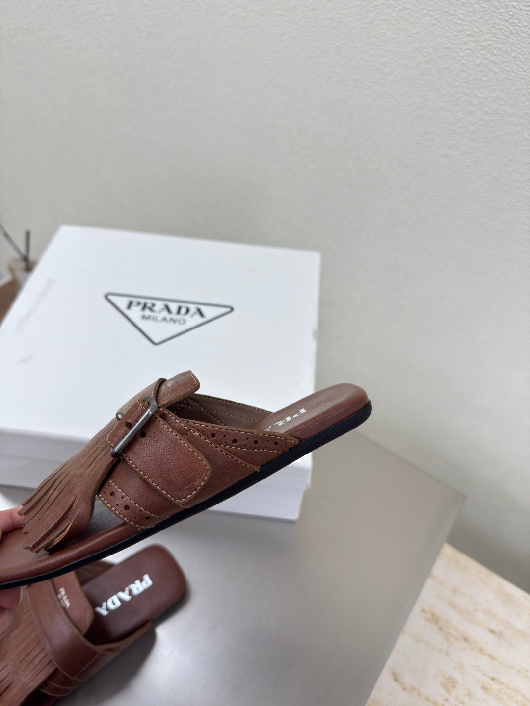 PRADA 25S SHUFFLE LEATHER THONG SANDALS IN SIENNA CALFSKIN