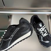 BOTTEGA VENETA 26S SNEAKERS IN BLACK TPU MATERIAL AND MESH FABRIC