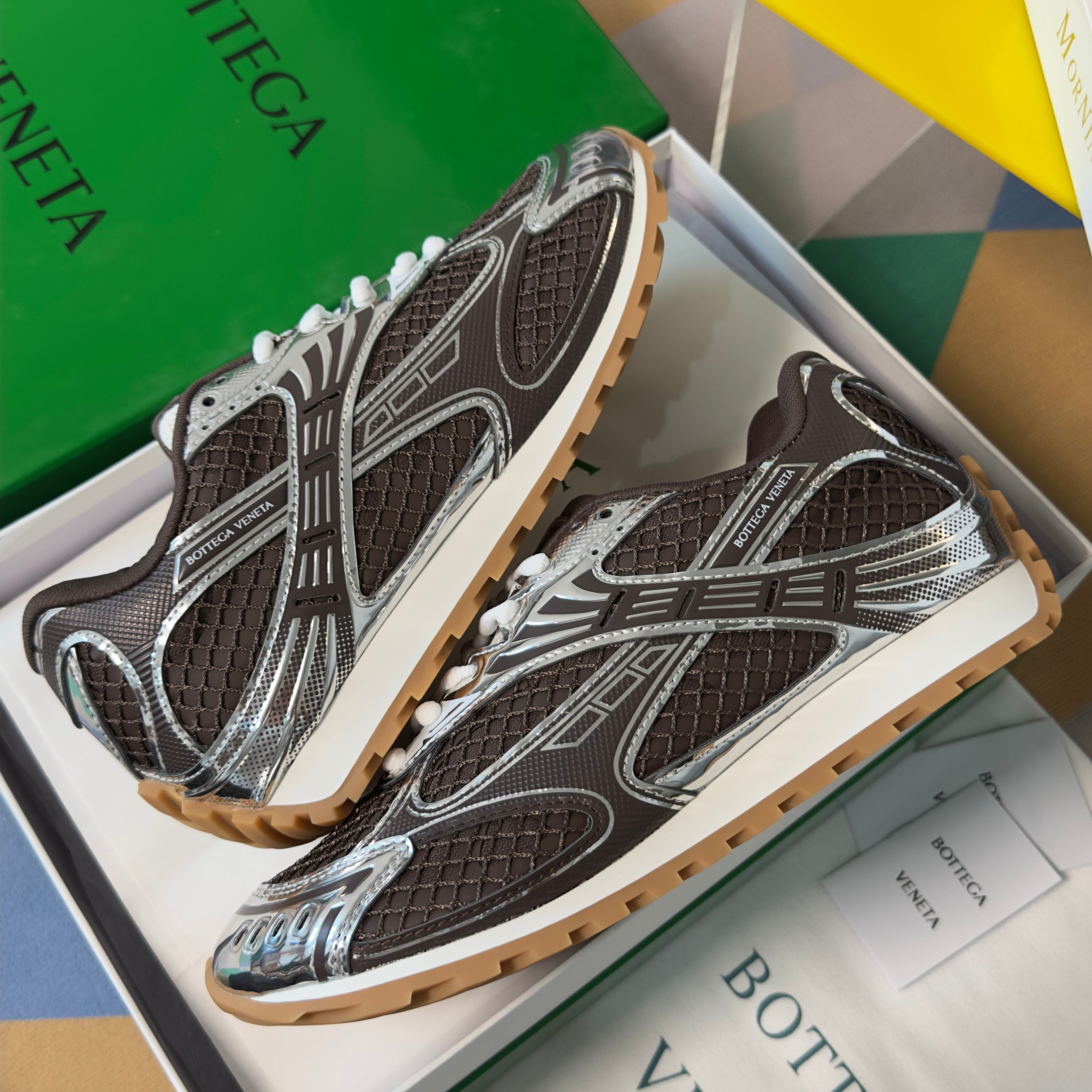 BOTTEGA VENETA 26S SNEAKERS IN DARK BROWN AND SILVER TPU MATERIAL