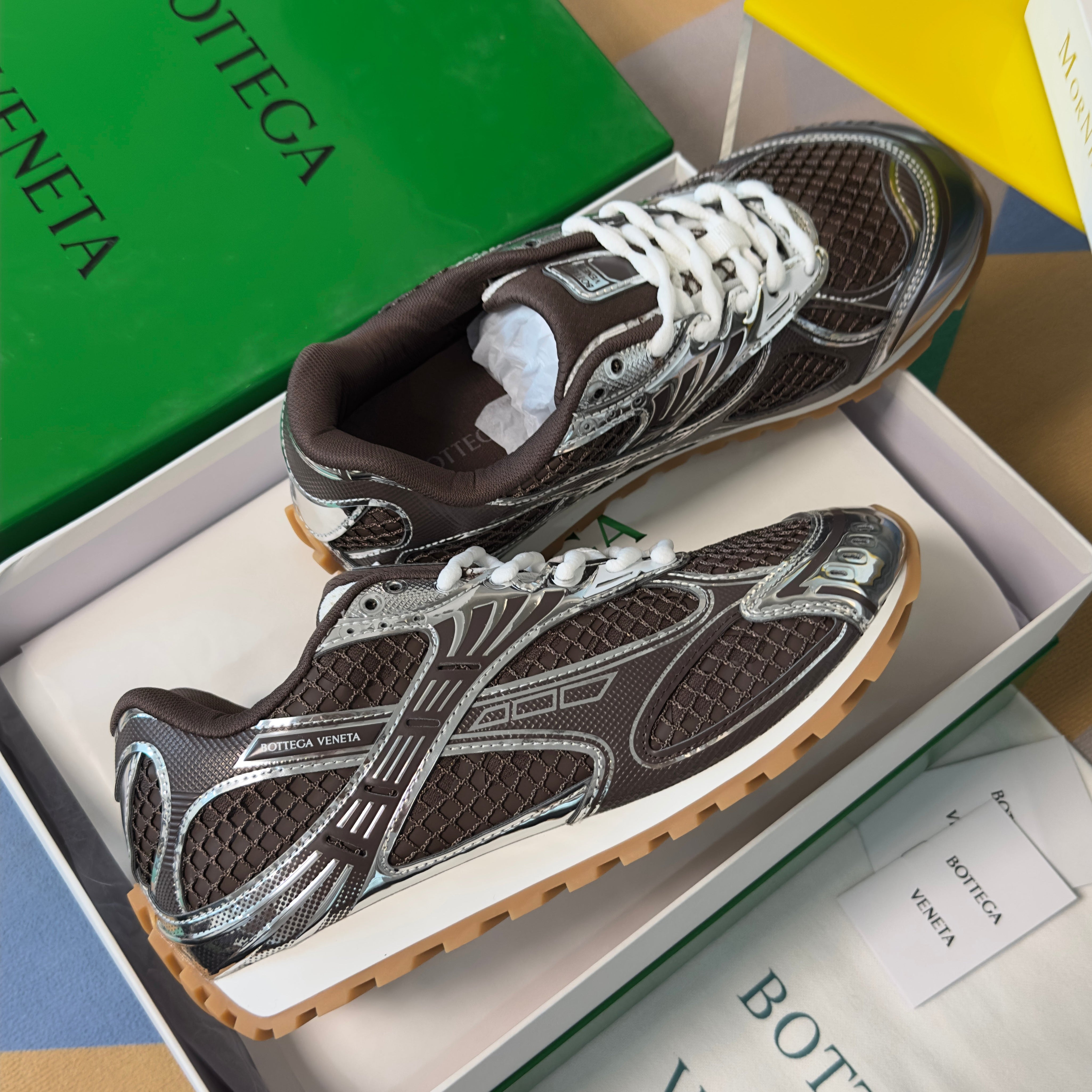 BOTTEGA VENETA 26S SNEAKERS IN DARK BROWN AND SILVER TPU MATERIAL