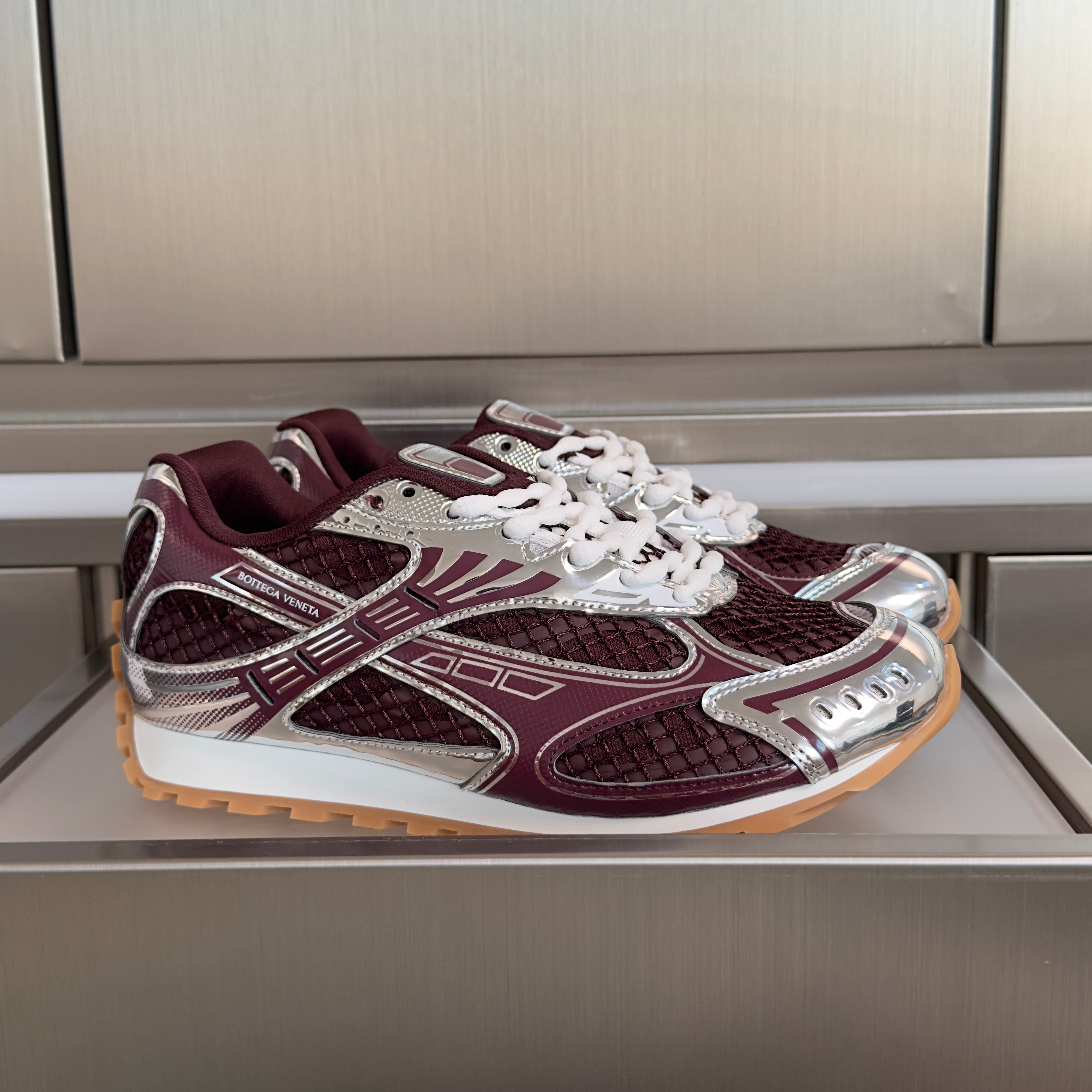 BOTTEGA VENETA 26S SNEAKERS IN DARK RED AND SILVER TPU MATERIAL