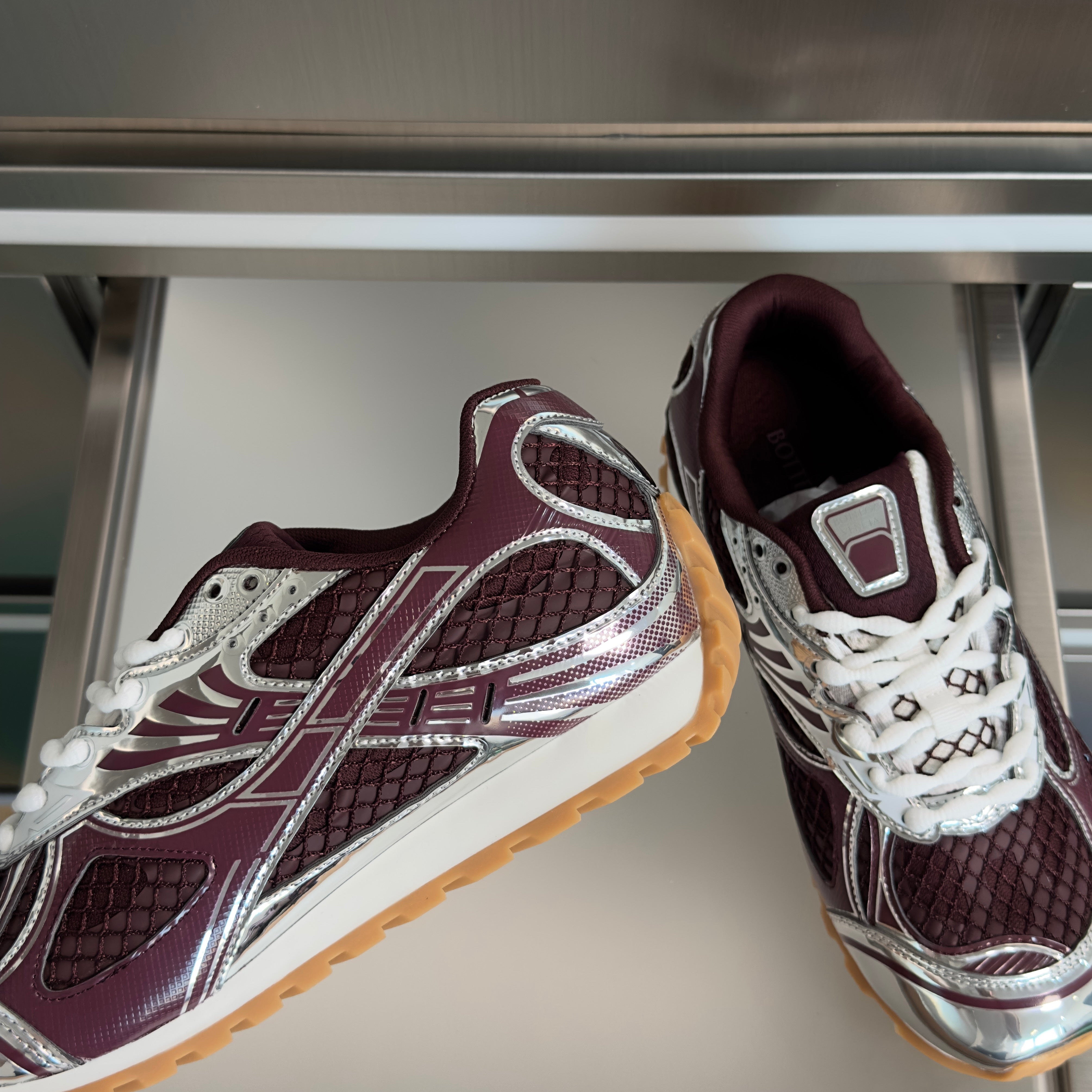 BOTTEGA VENETA 26S SNEAKERS IN DARK RED AND SILVER TPU MATERIAL