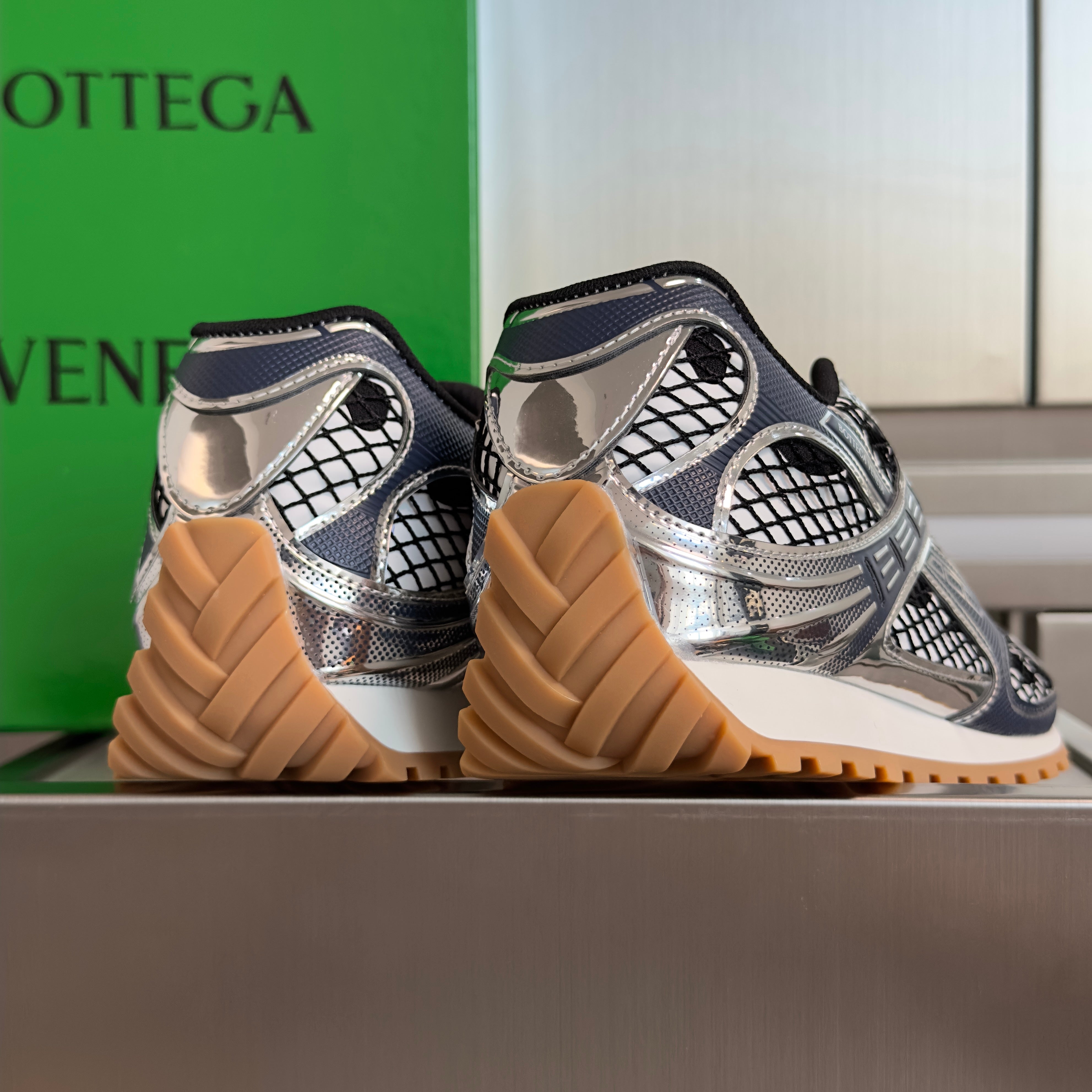BOTTEGA VENETA 26S SNEAKERS IN DARK BLUE GREY AND SILVER TPU MATERIAL