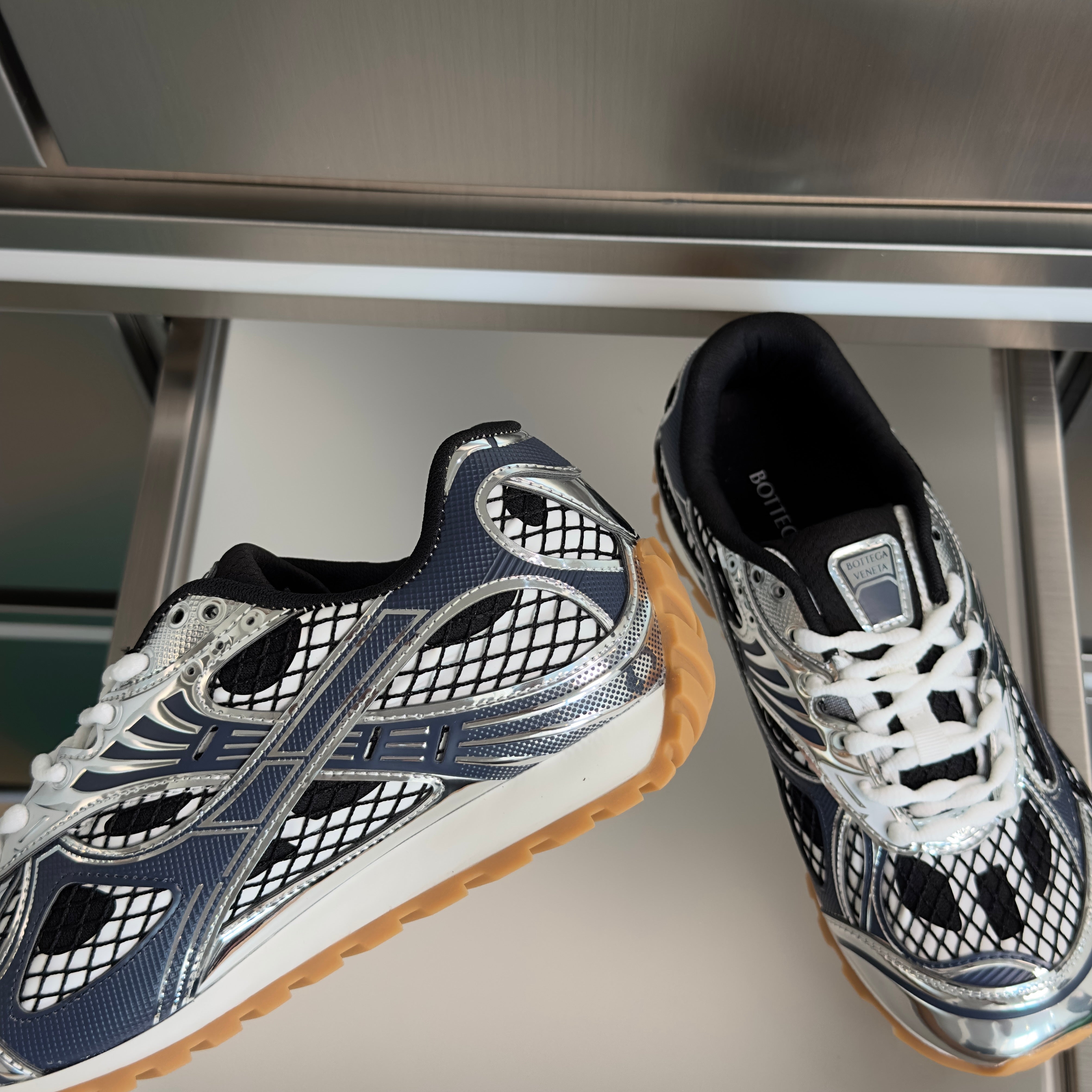 BOTTEGA VENETA 26S SNEAKERS IN DARK BLUE GREY AND SILVER TPU MATERIAL