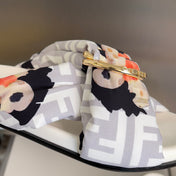 FENDI 26S PATTERNED CROSS-STRAP SLIDE SANDALS IN MULTICOLOR FABRIC