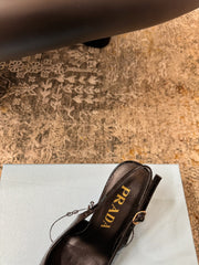 PRADA 25S SLINGBACK HIGH HEELS 75 MM IN BLACK EMBOSSED COWHIDE