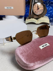 MIUMIU 26S SQUARE FRAME IN METAL 443523