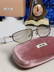 MIUMIU 26S RECTANGULAR FRAME IN METAL 426396