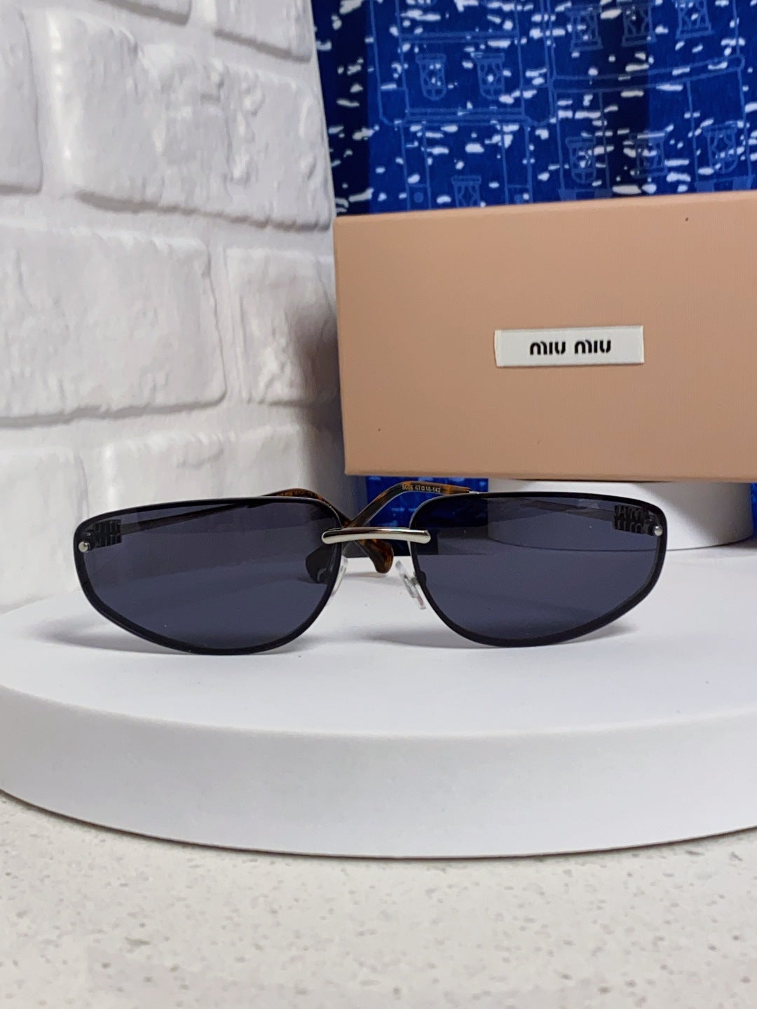MIUMIU 26S RECTANGULAR FRAME IN METAL 426399
