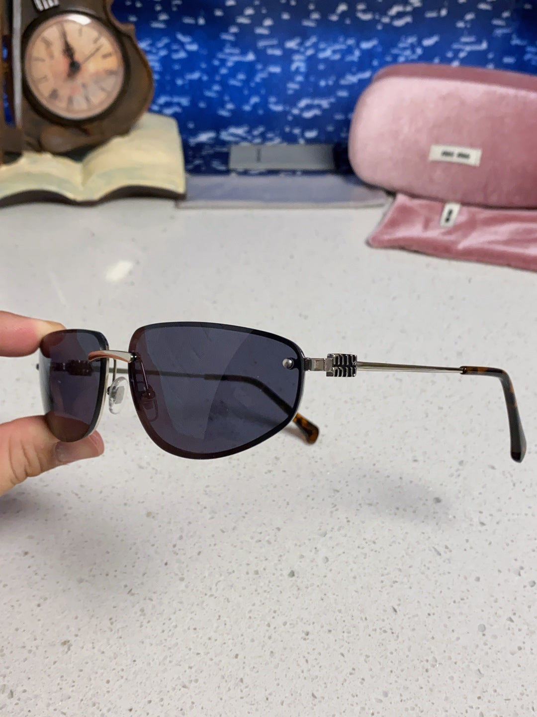 MIUMIU 26S RECTANGULAR FRAME IN METAL 426399