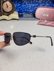 MIUMIU 26S RECTANGULAR FRAME IN METAL 426399