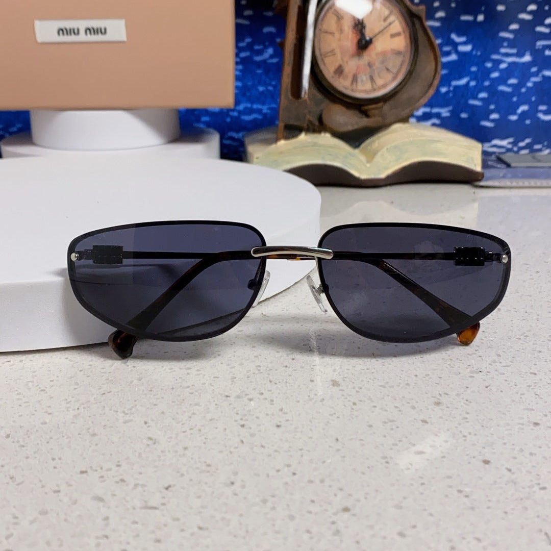MIUMIU 26S RECTANGULAR FRAME IN METAL 426399