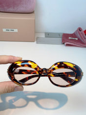MIUMIU 26S BUTTERFLY FRAME IN ACETATE 424491