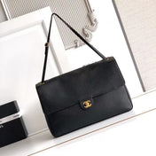 CHANEL 26S SOUPLISSIMO MAXI FLAP 39 IN BLACK GRAINED CALFSKIN GOLD HARDWARE